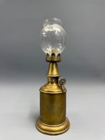 Lampe dite Pigeon de la marque Hirondelles.