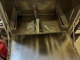 a stainless steel oven that is open in the kitchen