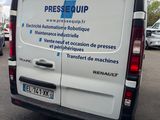 a white van that is parked in a parking lot