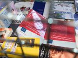 many books that are on the table together