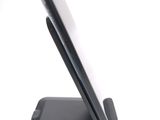 a cell phone that is sitting on top of a cell phone stand