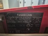 a close up of the back of a red machine