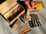 a box of cigarettes and a box of cigarettes on the ground