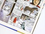 a comic book with a picture of a horse in the snow