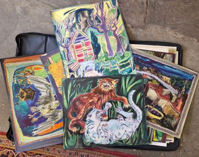 un grand nombre de livres posés sur le sol