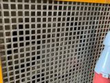 a close up of a yellow and blue electric heater