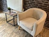 a chair that is sitting in front of a radiator