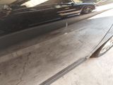 a picture of a car parked in a garage