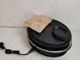 a bag of food sitting on top of a frying pan
