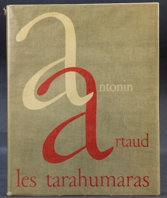 an old book with a red and white logo on it