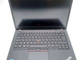 the laptop is open and ready to be used on the desk