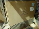 a cardboard box sitting on a pallet in a warehouse