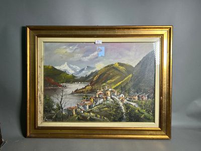 framed picture of a painting of a village by a river