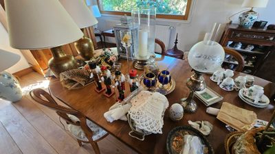 a wooden table with a lot of items on it