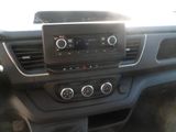 the dashboard of a car with a radio and a steering control