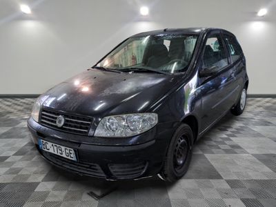 a picture of a black car parked in a garage