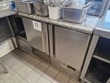 many pots and pans on the counter in the kitchen