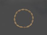 une image représentant un bracelet en or entouré d'une chaîne