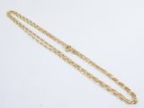 a gold necklace with a chain that is attached to it