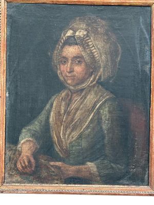 un vieux tableau représentant une femme en robe verte, coiffée d'un chapeau