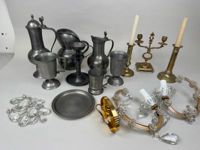 a lot of silver and gold items on the table