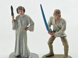 star wars figurines of luke skywalker and princess lei lei lei