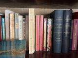 many books that are on the shelf together