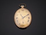 an old pocket watch with roman numerals on a black background