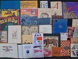 a lot of books that are on the table together