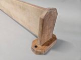 a close up of a piece of wood on a table