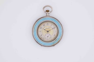 an image of a silver and blue pocket watch on a white surface