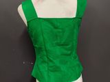 the back of a green top on a mannequin mannequin mannequin mannequin mann
