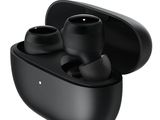 a close up of a pair of black earphones on a white background