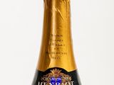 a bottle of champagne that is sitting on a table