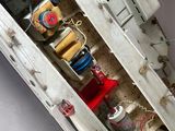 a small model of a boat that is sitting on a table