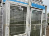 a large window that has been wrapped up on a pallet