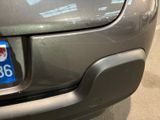 a close up of a car ' s bumper with a sticker on it