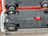 two toy cars that are sitting on top of each other