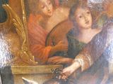 un tableau représentant une femme et un enfant jouant d'un instrument de musique