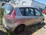 a small car that is parked in a lot