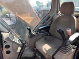 a view of the inside of a vehicle from the driver ' s seat