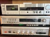 several different types of audio equipment are stacked on top of each other
