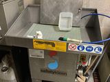 a machine that is sitting in the corner of a room