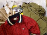 a pile of clothing that is sitting on a table