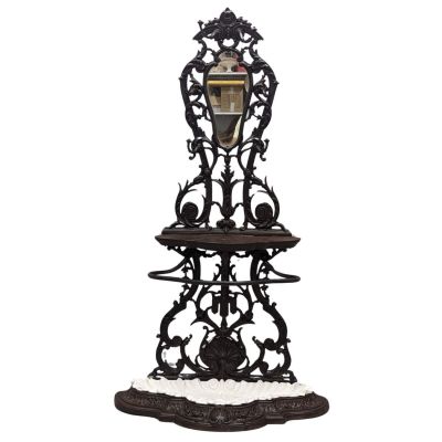 an image of a clock on a stand with snow on the ground