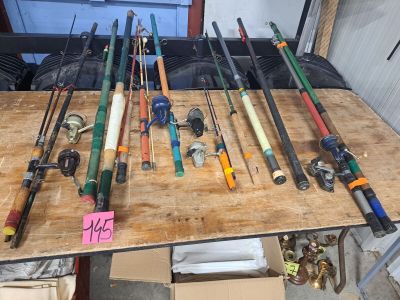 a lot of fishing rods that are on a table