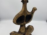 figurine en laiton représentant un canard coiffé d'un chapeau