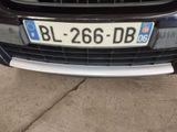 a car that has a license plate on the front of it