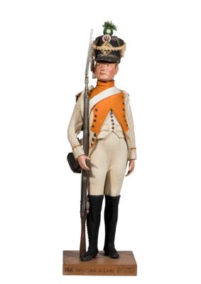 statue d'un homme en uniforme, muni d'un fusil et portant un chapeau