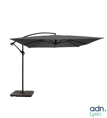 une image représentant un parapluie noir posé sur un support, sur fond blanc